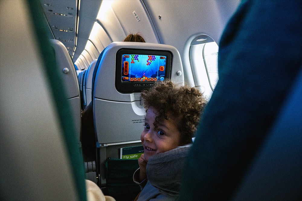 Elijah on plane to New York
